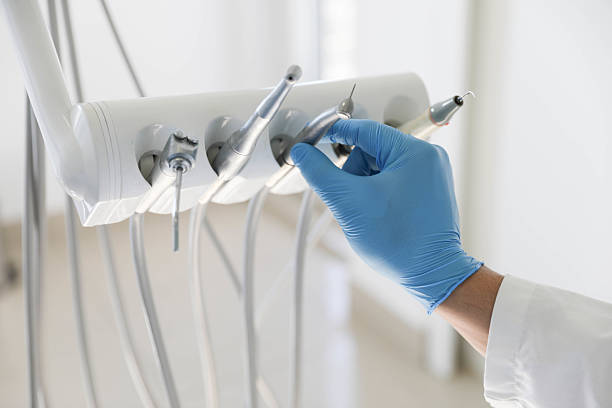 Professional Tooth Extraction technician working in Burke County County, NC